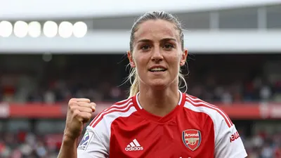 A focused Arsenal Women midfielder, athletic build, late 20s, in solid red kit with smooth fabric, celebrating a goal...