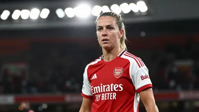 A mid-30s female midfielder in a red Arsenal Women kit, waist-up, intense focus, background blurred stadium lights, eyes...