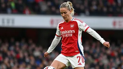 A photorealistic image of an anonymous Arsenal Women's player, aged 25-30, wearing a red jersey with white sleeves, and...
