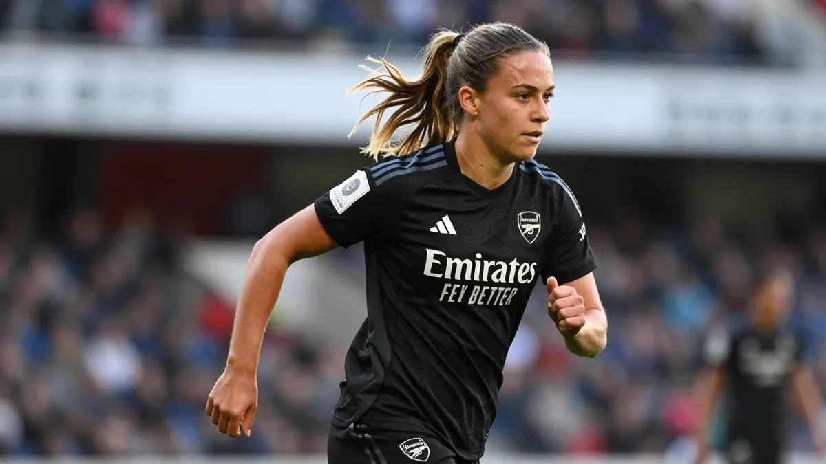 19-year-old Arsenal Women winger, a slender build with energetic movement, is captured in a tight action crop, waist-up...